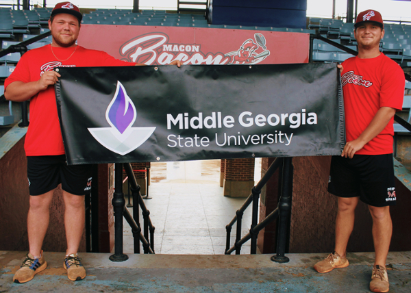 (L-R) Knights baseball players Carter Oglageo, 20, and Ethan Gill, 20, are playing summer baseball for the Macon Bacon.